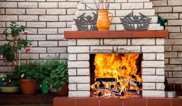OUTDOOR FIREPLACE ON A BLANK WALL