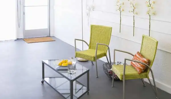 Use A lighter color or transparent furniture